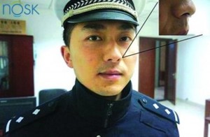 Policía chino con Filtro nasal Nosk 